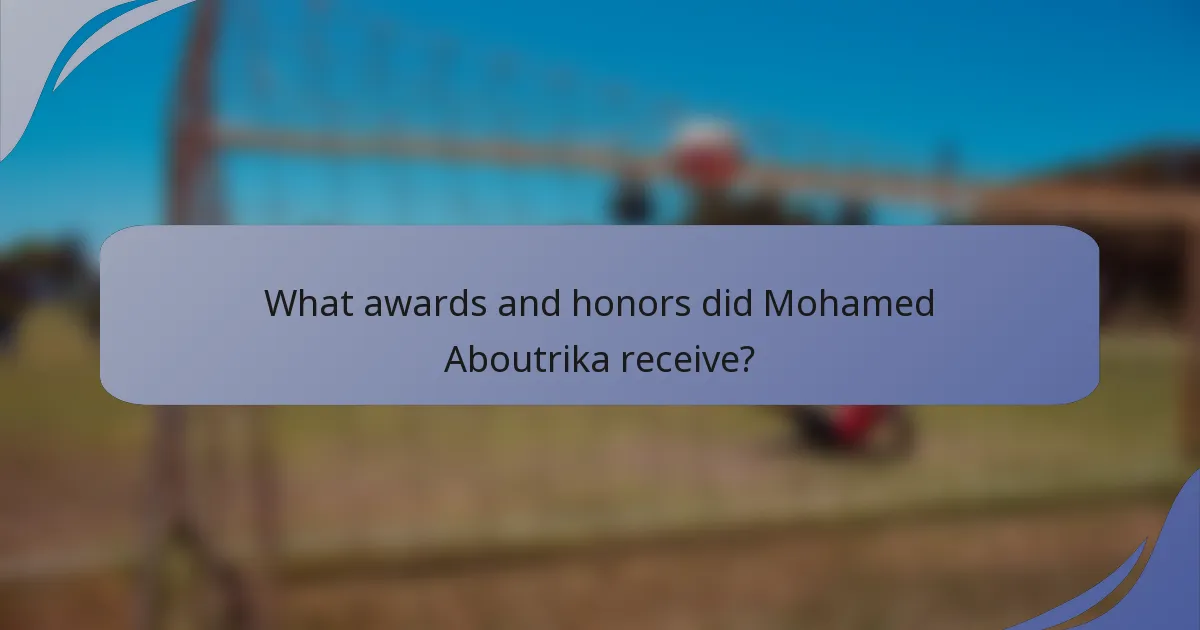 What awards and honors did Mohamed Aboutrika receive?